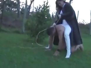 Mistress in Fur riding a slave