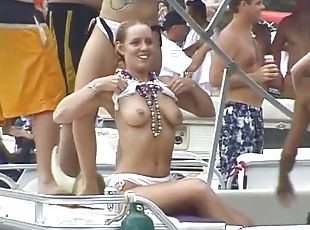 Babes flashing tits and ass while partying on the yacht