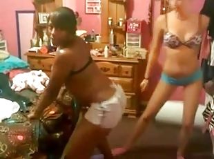 Black bitch and her Gf shake their butts in front of a webcam