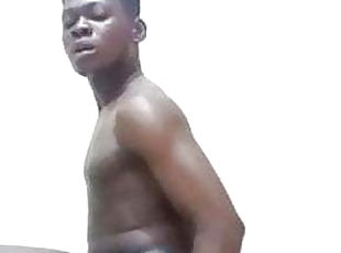 Nigerian boy stripping