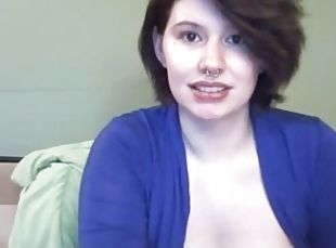 Pierced brunette shows her big natural tits and masturbates