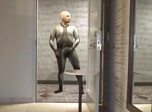 showing dolphin wetsuit bulge and silicone mask at hotel door and w...