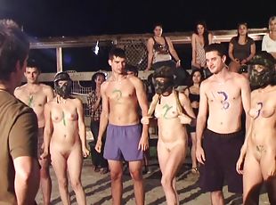 Sexy party outdoors at night on the beach