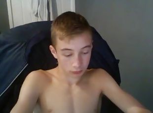 Hot twink strips and cuts himself