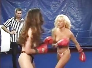 CatFight Topless female boxing as blonde battles brunette with body...