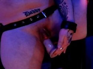 Horny tattooed FTM plays with his swollen cock and squirts in leath...