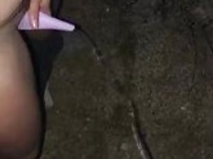 Husband & Wife stand to pee together outdoors, she uses a Go Girl /...