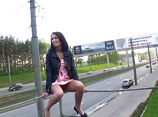 Brunette in dress shows off her shaved puss on public