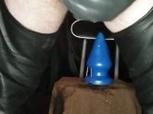 Leather bear daddy sitting on huge anal plug from Topped Toys 
