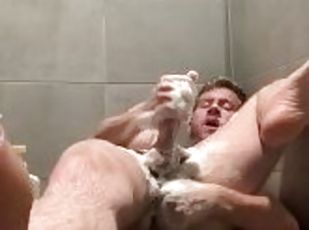 Blonde Otter Getting Out a Nut on the Floor of the Public Shower at...