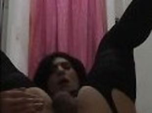 Cute Colombian shemale wearing sexy lingerie plays with dildo in he...