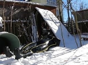 Cyborg in the snow - with Latex Rubber Suit in the snow