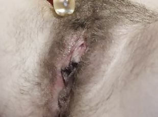 Hairy bushy pussy playing with glass dildo on last day of period be...