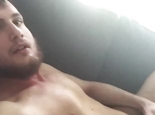 Hot guy films himself masturbating on the couch
