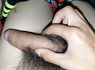 Rubbing pubic hair and cock