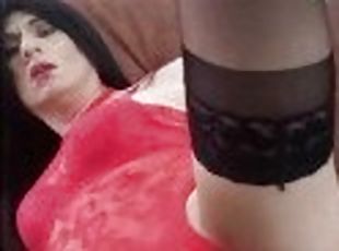 cute shemale in sexy red fishnet plays with butt plug and jerks off...