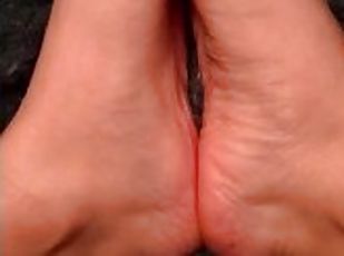 Slow motion oily feet rubbing together ????