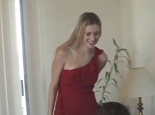 Victoria has fun in a red dress
