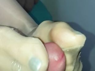 Nylon footjob with polished silver nails and toes