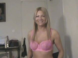 Cute blonde babe in pink lingerie sucks a dick in a bedroom