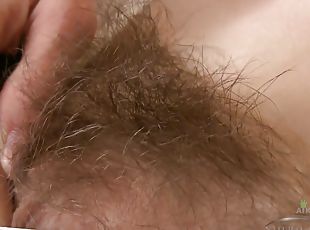 hairy girl shows her body: bushy cunt and hairy armpits