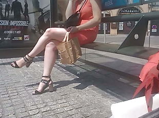 Woman with chubby sexy legs on bus stop