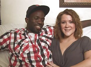 Interracial fucking on the sofa with a BBC and a smiling blonde