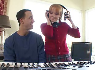 Cute strawberry blonde girl, Carolina West, is hot for her music te...