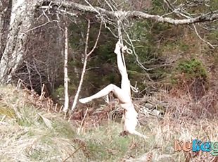 Naked self-bondage in the woods gone wrong.