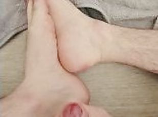Straight man playing with his big uncut cock and cumming over his feet