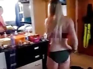 Blonde Bimbo Jumping Around & Taking Her Clothes Off