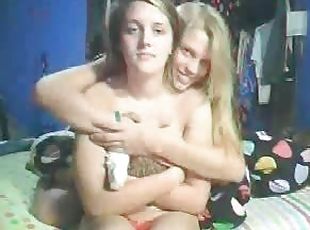 Two teens playing with each other on cam