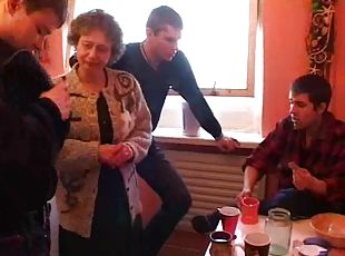 Horny granny gets fucked by multiple guys at the same time