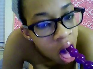 Exotic girl with glasses fucks her pussy with a small dildo