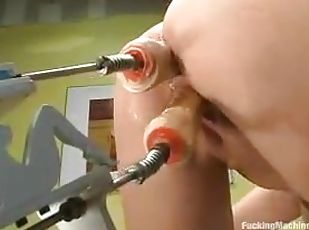 Busty brunette is enjoying her time on a fucking machine