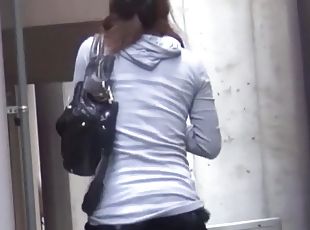 Asian babe takes her clothes off and pees in public