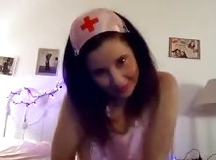 Sexy Nurse playing with her toys