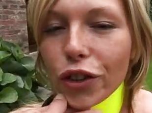 Toys in the pussy of the blonde girl outdoors
