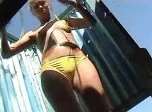 Hidden camera shows girls changing at beach