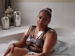 A fantastic fat ass in the bathtub