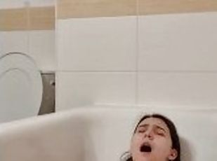 Cute brunette reach orgasm in hot bath