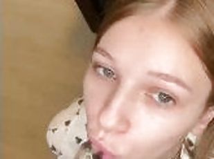 Luscious blonde passionately sucks and jerks off a big dildo