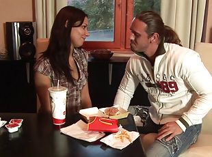 Busty brunette shares a meal with her new stud then gets screwed hardcore