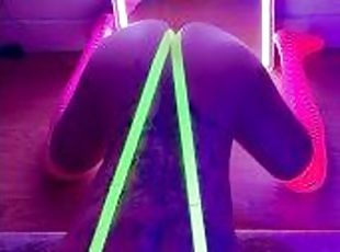 Blacklight rave slut dresses up in neon to masturbate and play with...