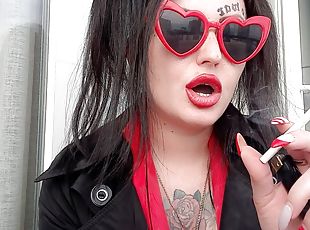 Sexy smoking fetish from Dominatrix Nika. Mistress smokes 2 cigaret...