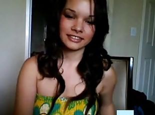 Hot busty brunette on webcam teasing and seducing with her sexy boobs