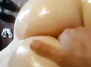 Oiled massage with finger in ass