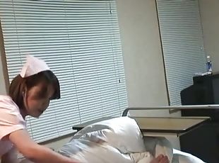 Dirty Japanese nurse gives a blowjob and enjoys having 69 on the bed