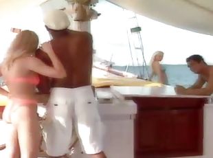Two couples having great sex on a sailing ship in the middle of the...