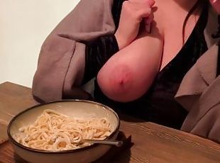 Big natural boobs in a restaurant